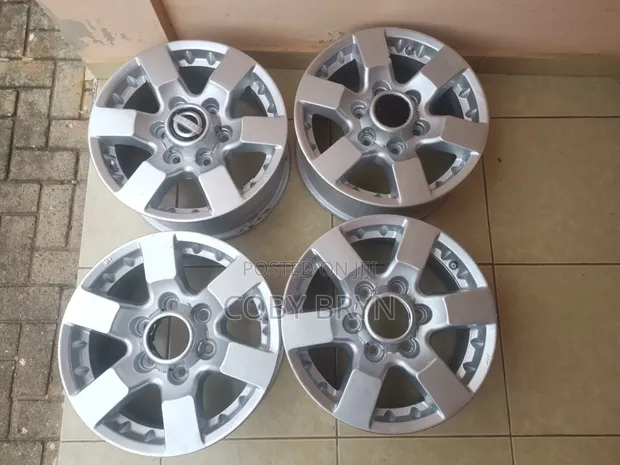 Nissan Hardbody 16" Original Rims with Cups - 1