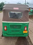Bajaj RE 2025 Green Three-Wheeler - 1
