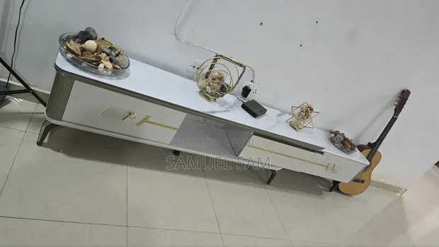 Foreign TV Stand with 3 Drawers - 1
