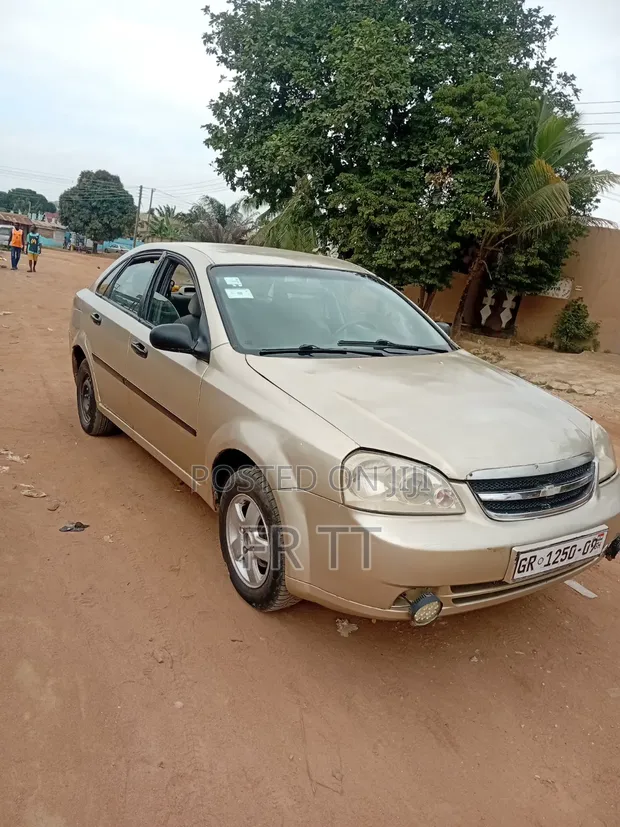 Chevrolet Optra 2010 Gold - 1