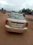 Chevrolet Optra 2010 Gold - 4