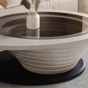 Sculptural Center Table with Black Glass Top