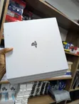 PS4 Pro with 2 Controllers and Games - 1