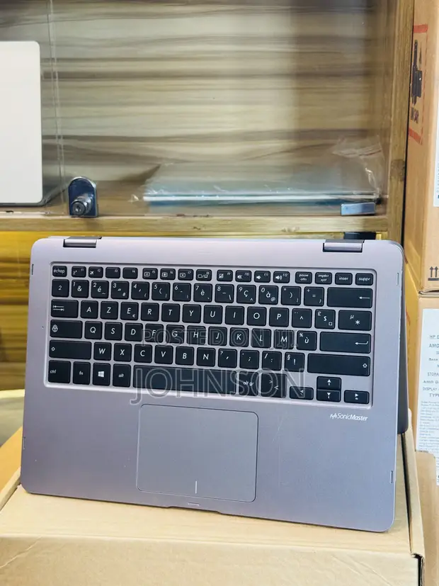 Asus VivoBook Flip 14 TP401CA Convertible Laptop - 1