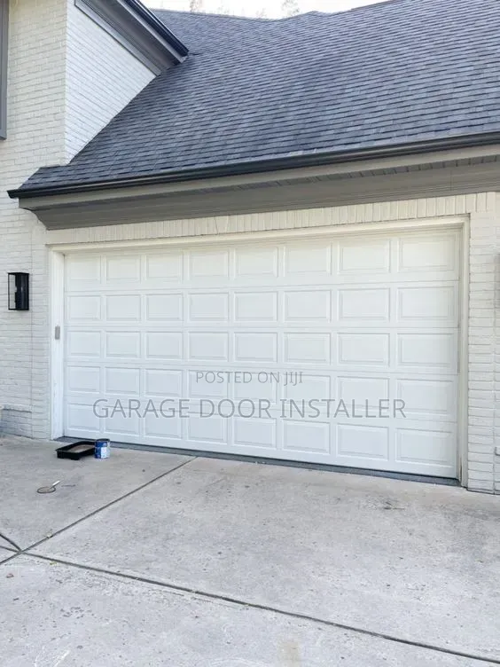 Brand New Automatic Garage Door with Remote - 1