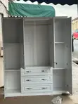 Modern 4-Door White Wardrobe with Drawers - 1