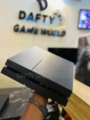 PS4 Fat Console with 2 Controllers and Loaded Games