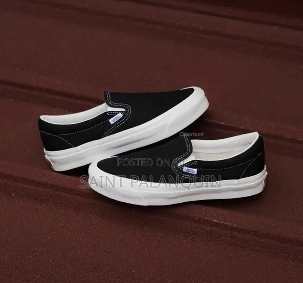 Classic Black Canvas Vans Slip-On Sneakers - 1