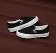 Classic Black Canvas Vans Slip-On Sneakers - 1