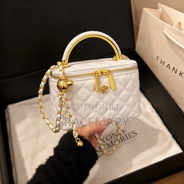 Channel Quilted Handbag - 1