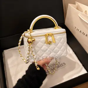 Channel Quilted Handbag