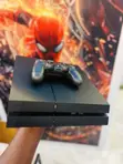 PS4 Fat Console with 2 Controllers and Loaded Games - 1
