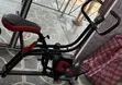 Black and Red Dual-Action Stationary Exercise Bike - 1