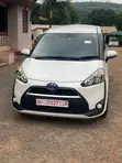 Toyota Sienta 1.5 Hybrid FWD 2015 White - 1
