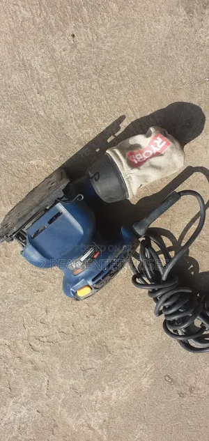 Ryobi Corded 1/4-Sheet Palm Sander with Dust Bag