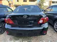 2010 Toyota Corolla LE Sedan - Black - 1