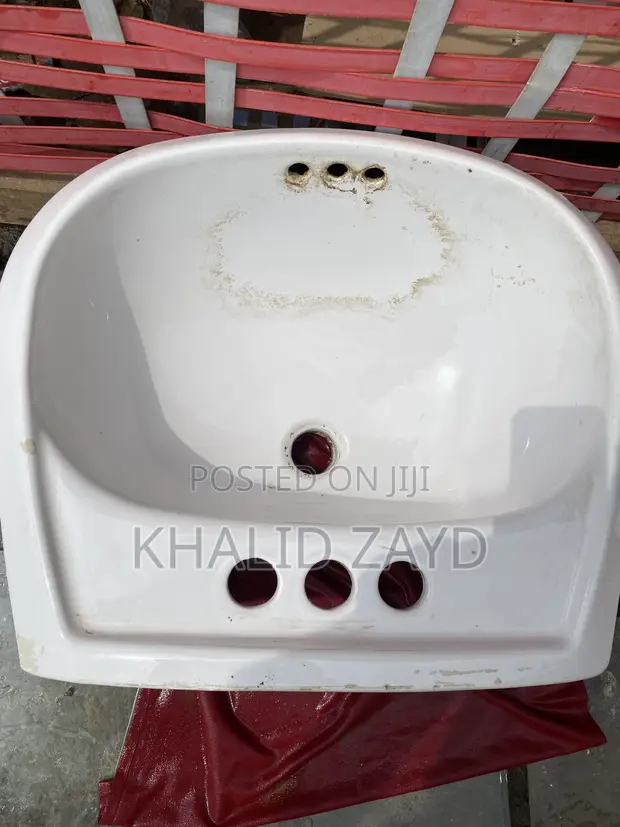 White Ceramic Wall-Mounted Wash Basin - 1
