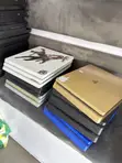 PS4 Pro 1TB with 16 Games & 2 Controllers - 2