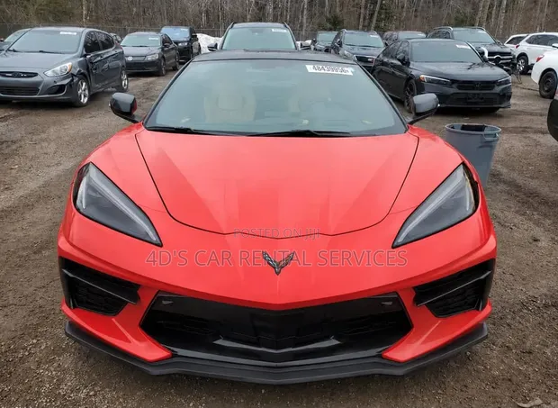 4D's Car Rental Services - Red Hybrid Car - 1