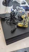 PlayStation 4 Pro with 2 Controllers, 17 Games, and Charging Dock - 2