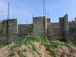 Titled Land with Uncompleted 3-Bedroom Storey Building in Madina - 2