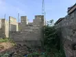 Titled Land with Uncompleted 3-Bedroom Storey Building in Madina - 5