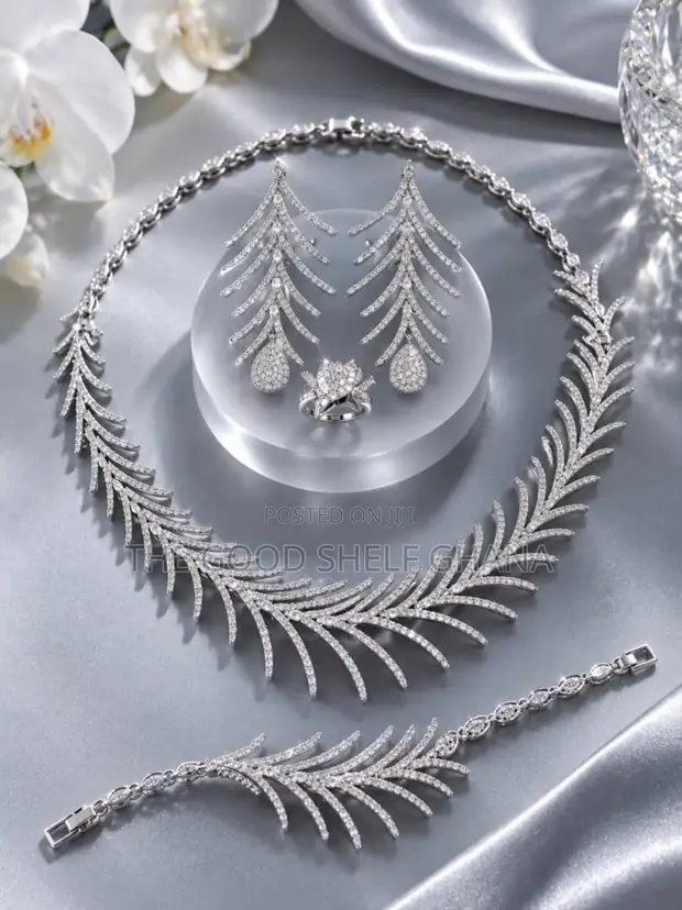 Silver Necklace Set with Earrings, Bracelet, and Ring - 1