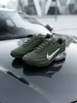 Olive Green Nike NOCTA Glide Sneakers - 1