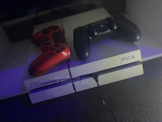 Used PS4 with 2 Controllers and Games - 1