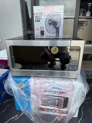 Midea 62L Microwave Oven with Defrost & Delay Start | 1200W