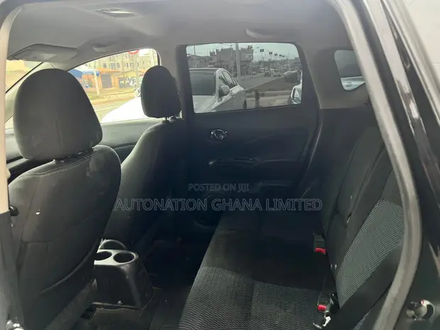 2014 Nissan Versa 1.6 SV Sedan - Black - 1
