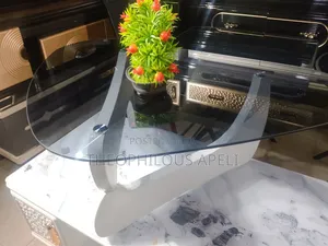 Royal Comfort Triangular Glass Center Table