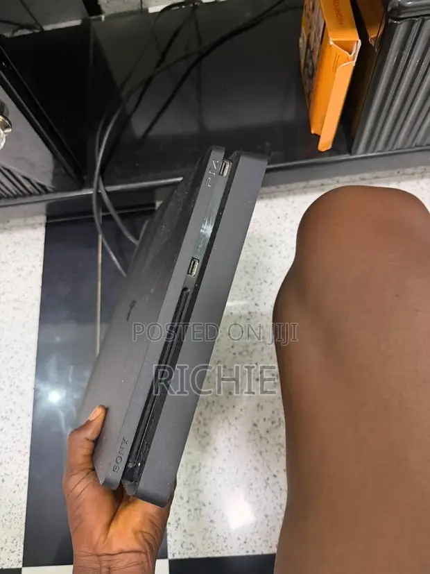 PS5 Standard Console with 4 Games - 1