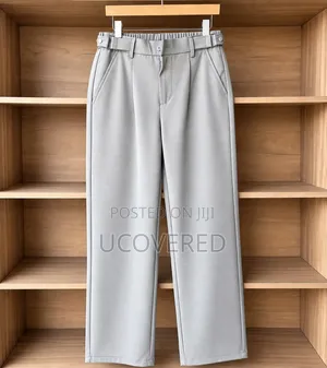 Relaxed-Fit High-Waisted Pleated Trousers
