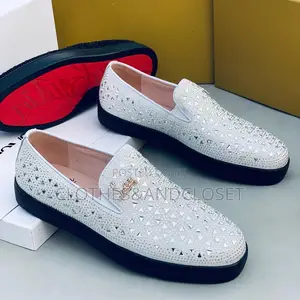 Christian Louboutin Slip-on Loafer with Cutout Pattern