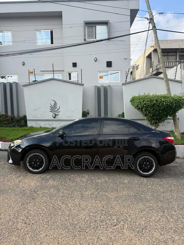 2015 Toyota Corolla LE Sedan - Black - 1