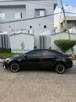 2015 Toyota Corolla LE Sedan - Black - 1