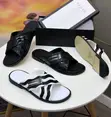 Original Gucci Crossed Slippers - Black/White - 1
