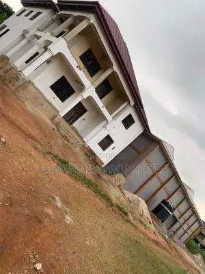 Spacious Warehouse with 8-Bedroom House for Rent in Kumasi