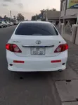 Toyota Corolla 2010 White - 1