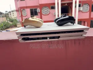 PS4 Pro 1TB Console with 2 Controllers & 10 Games