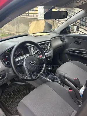 Kia Rio SX 2010 Red Sedan