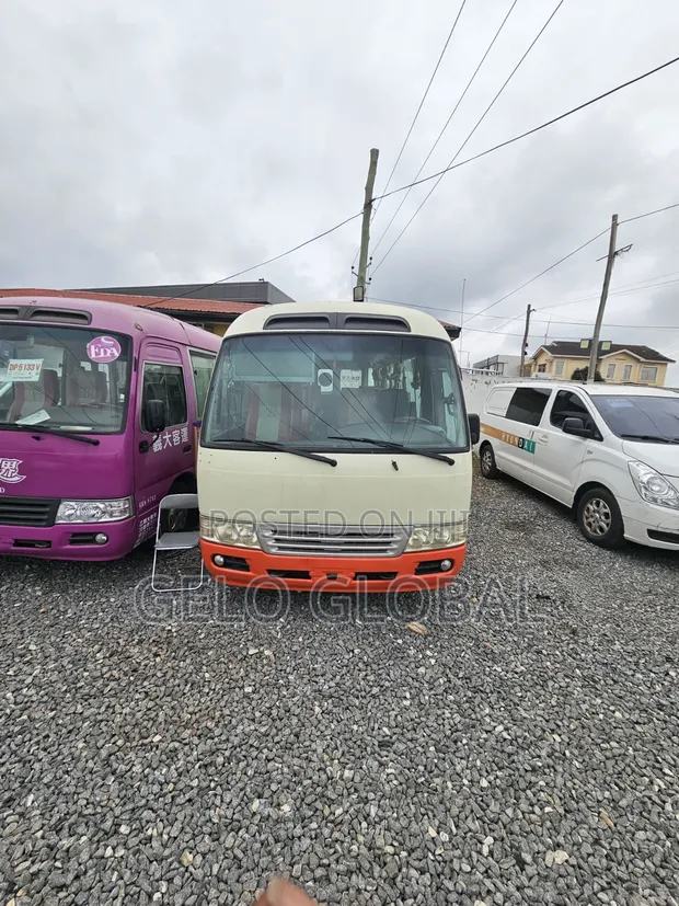 Toyota Coaster 2011 Gold - 1