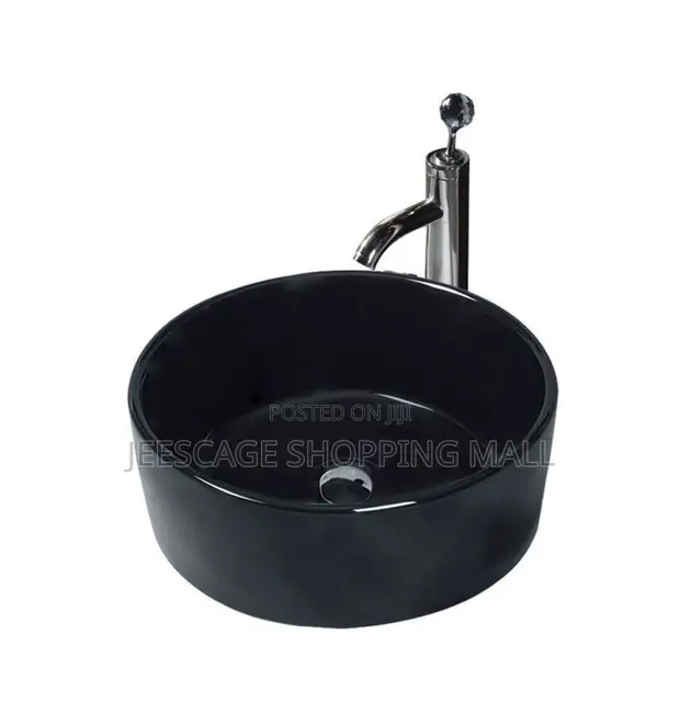 Modern Black Ceramic Vessel Sink with Gold Faucet and Drain Combo - 1