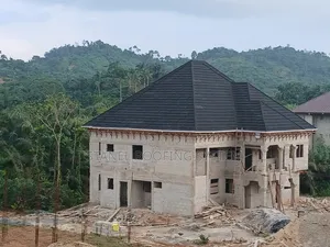 Black Quality Roofing Sheets & Rain Gutter Installation