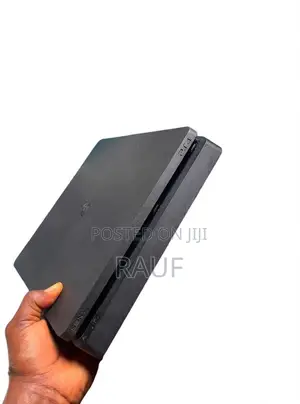 PS4 Slim with 10 Games and 2 Controllers