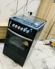 Brand New Black 4 Gas Burner Glass Volcano Cooker (50x50) - 1