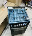 Brand New Black 4 Gas Burner Glass Volcano Cooker (50x50) - 2