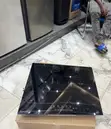 Kenwood 60cm Tempered Glass 4 Electric Hob (Black) - 1