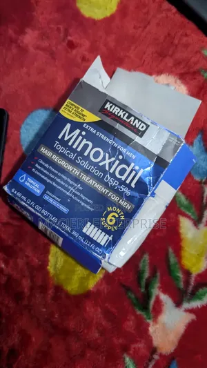 Kirkland Minoxidil Hair Growth Oil with Derma Roller